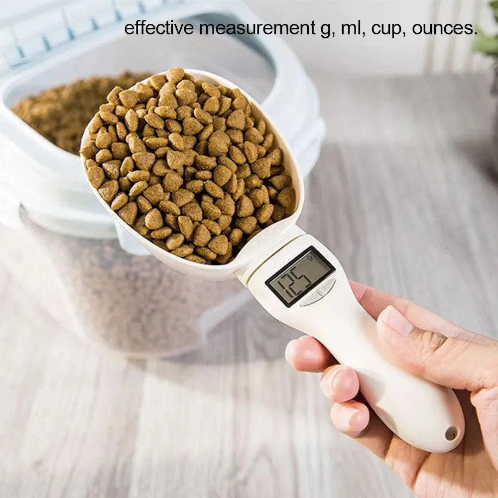 Digital pet food measuring spoon with LED display showing weight in grams, ideal for accurate pet food portions.