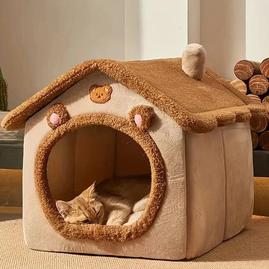 Foldable cozy cave pet bed with a sleeping cat, designed for comfort and easy storage.