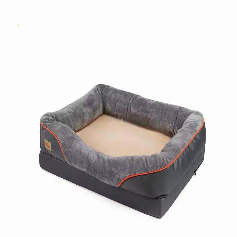 Orthopedic dog bed with memory foam, offering joint support and comfort, with waterproof cover and bolstered sides.