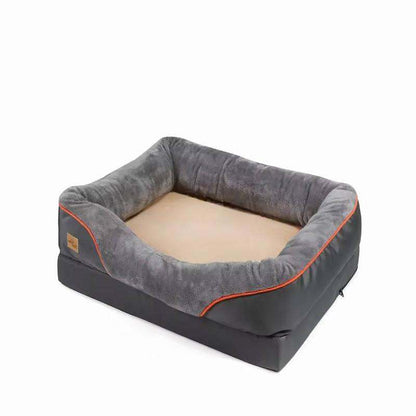 Orthopedic dog bed with memory foam, featuring soft bolstered sides and washable cover.